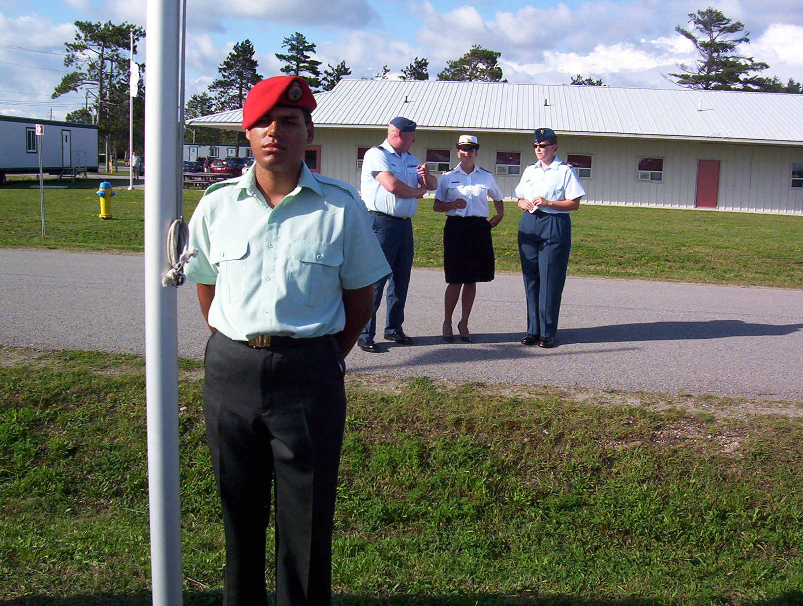 standing by the flagpole — photo 3